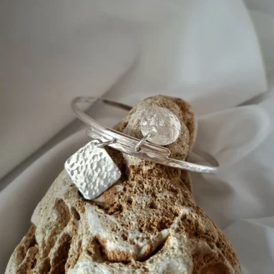 Between Textures-ασημένιο χειροποίητο cuff με κρεμαστά στοιχεία.